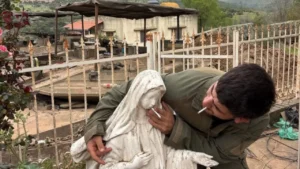In latest demonstration of Judah-ism’s incurable hatred for any and all things related to Christianity, IDF terrorist photo’d holding cigarette to the mouth of Virgin Mary statue